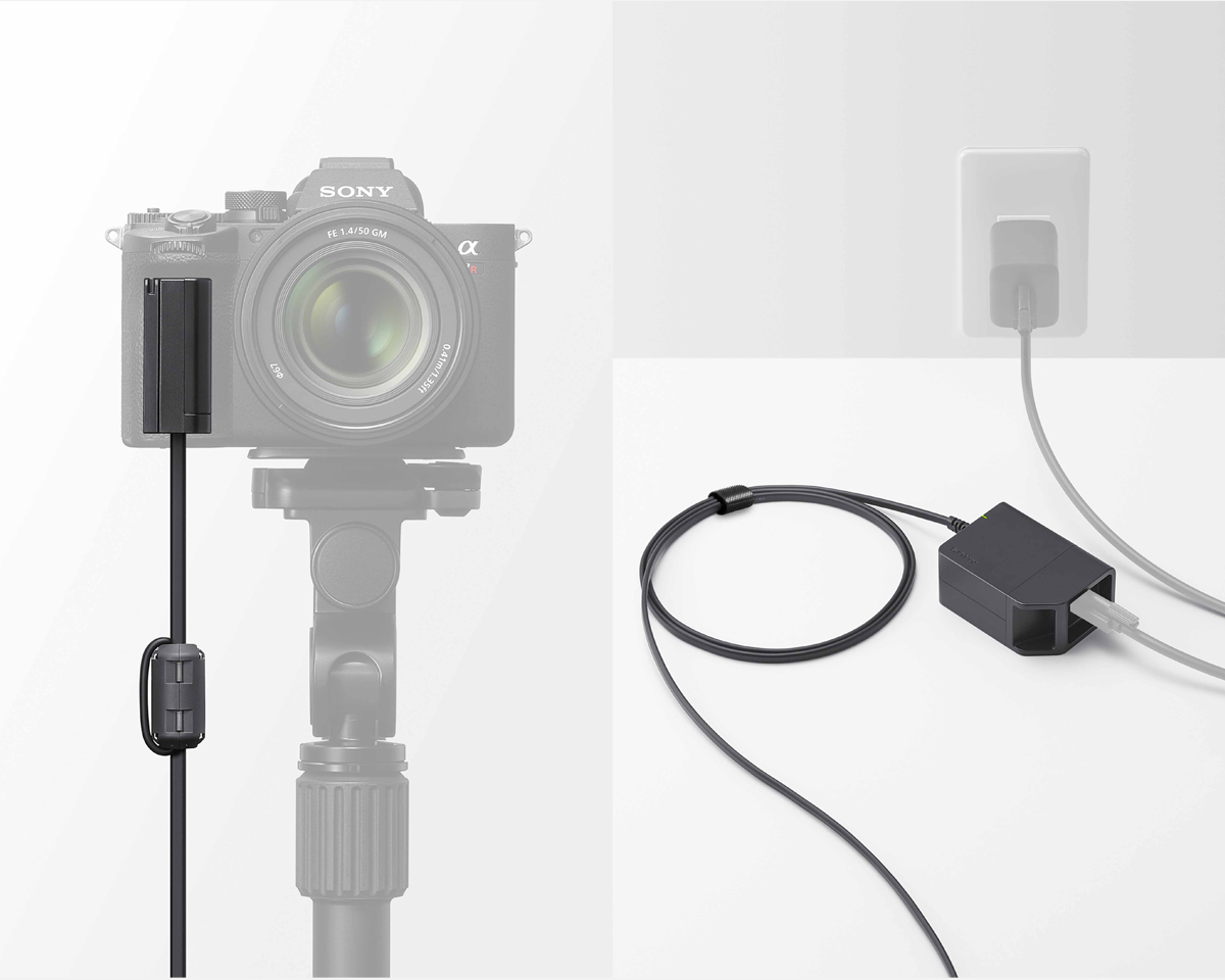 메인 콘센트의 USB 전원 공급 소켓에 연결된 DC-C1과 카메라 본체에 삽입된 플러그인 플레이트 이미지